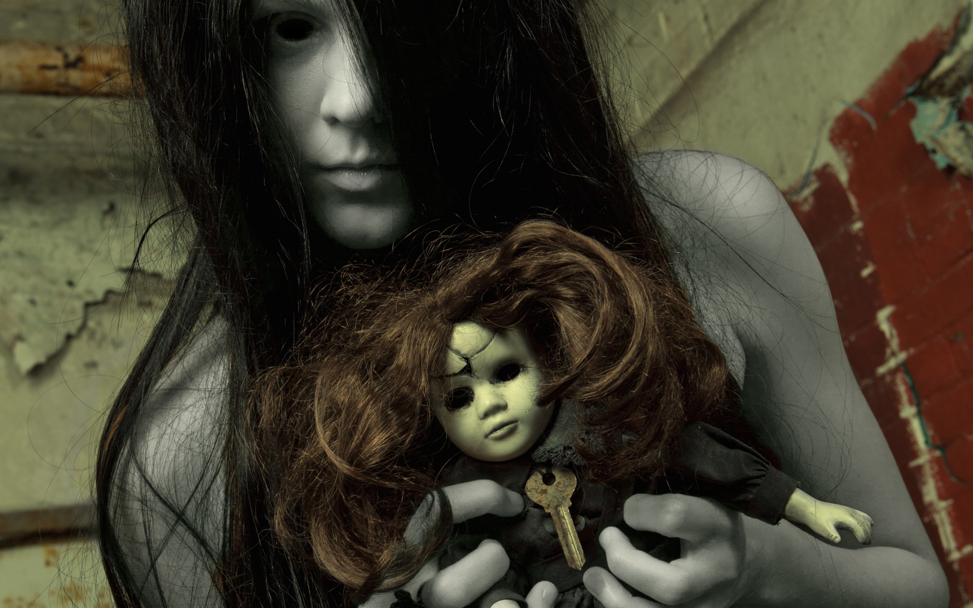 Ghostly dead girl with creepy doll