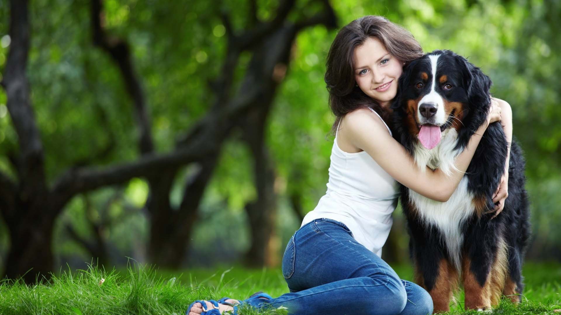 Cute girl and dog at garden